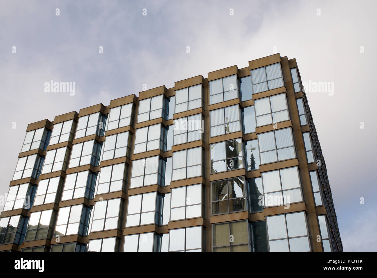 Office building with reflections in the windows Stock Photo - Alamy