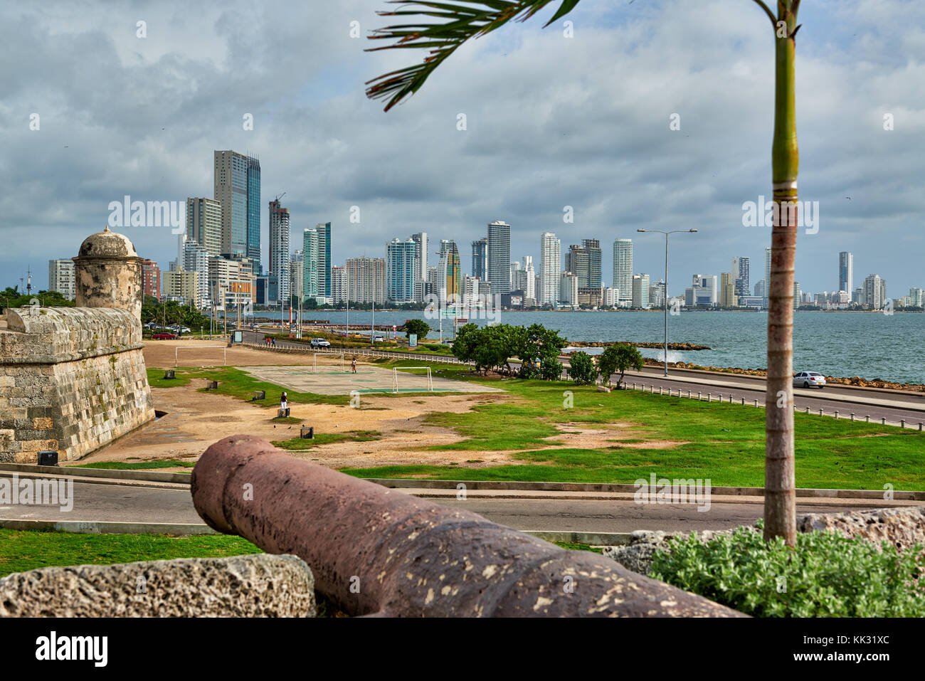view over cannon of old town to skyline of new district Bocagrande, Cartagena de Indias, Colombia, South America Stock Photo