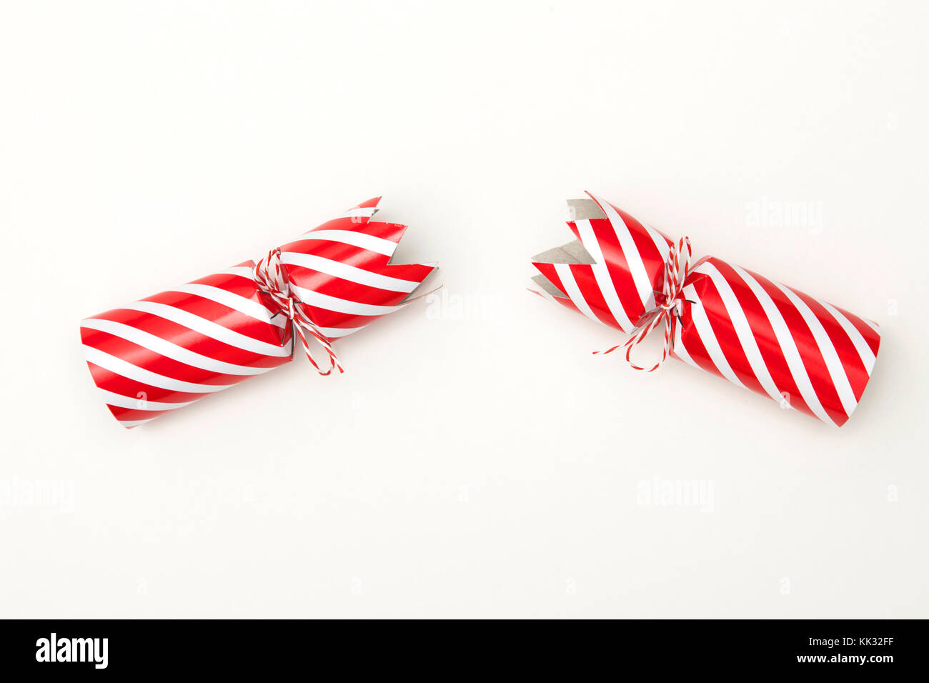 Pulled christmas cracker on a white background crackers Stock Photo Alamy