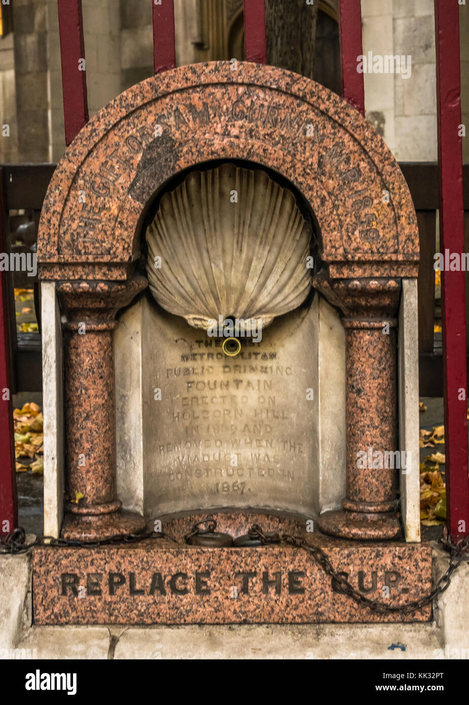 London's first and oldest Victorian granite drinking fountain, St Sepulchre without Newgate Church, with Replace the Cup lettering, London,England, UK Stock Photo