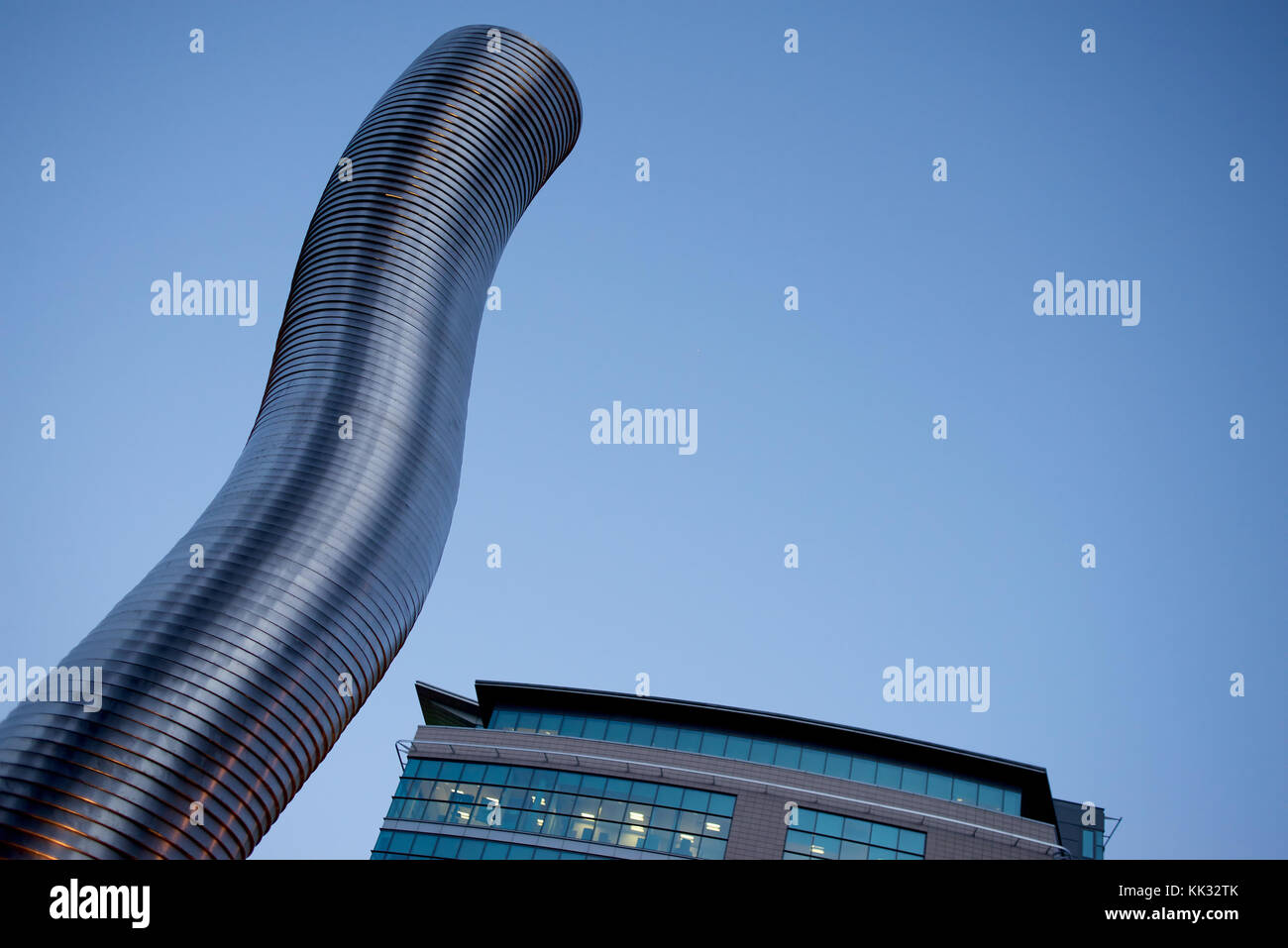Building and twisting ventilation shaft of metal Stock Photo Alamy
