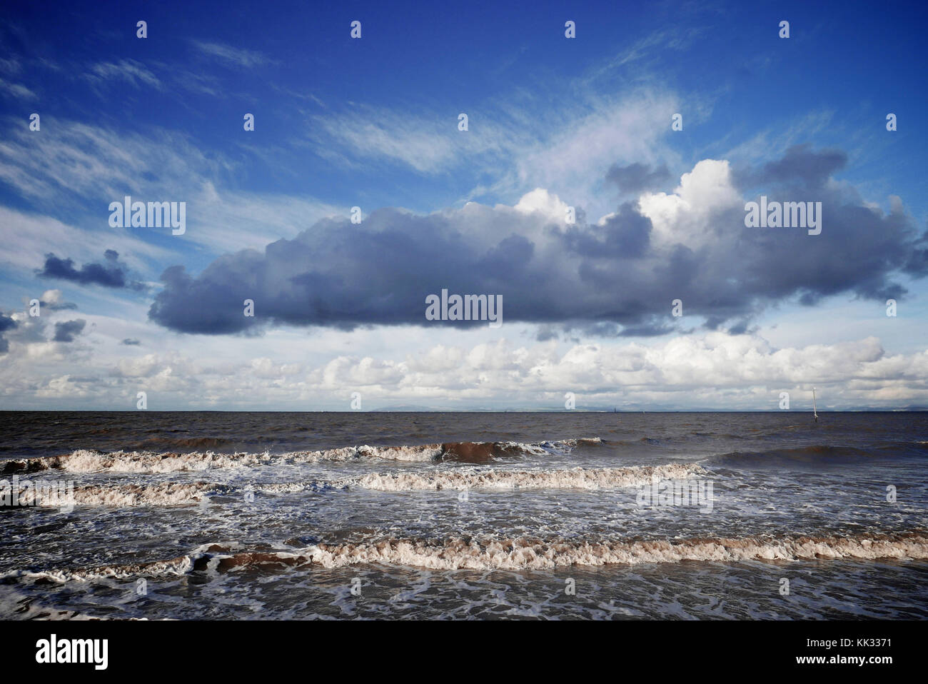 Storm clouds over a dark rough sea in winter Stock Photo