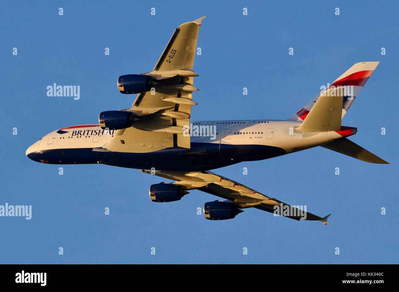 Airbus A380, British Airways, climbing out from London heathrow Airport, UK, at sunset. Stock Photo