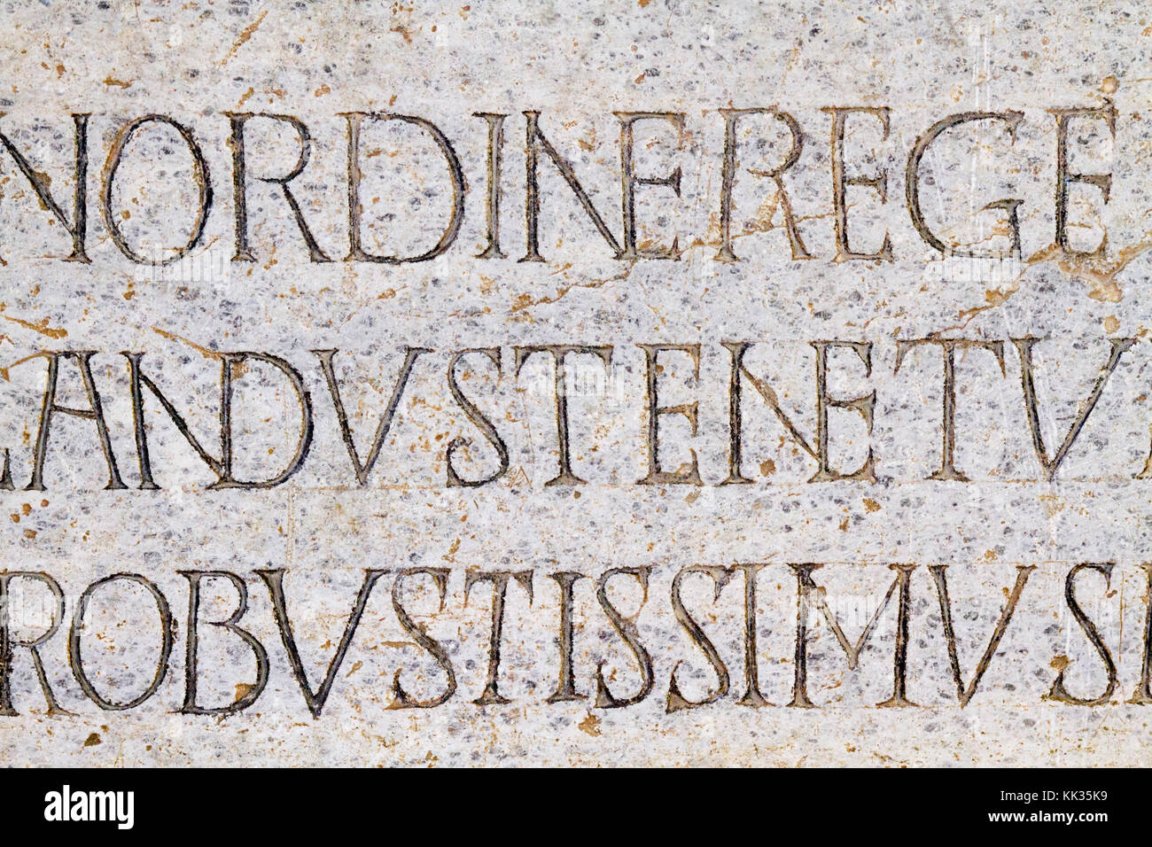 Pavia, Italy. November 11 2017. Rythmic epitaph on the marble gravestone of the Lombard King Cuniperto (also called Cuningpert, Cunicpert, Cuninopert) Stock Photo