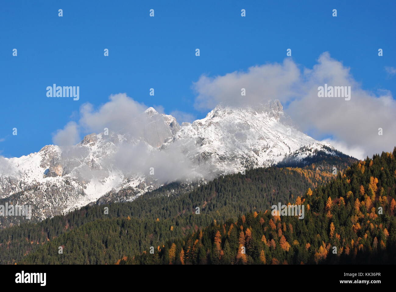 the first snow covers the mountains Stock Photo - Alamy