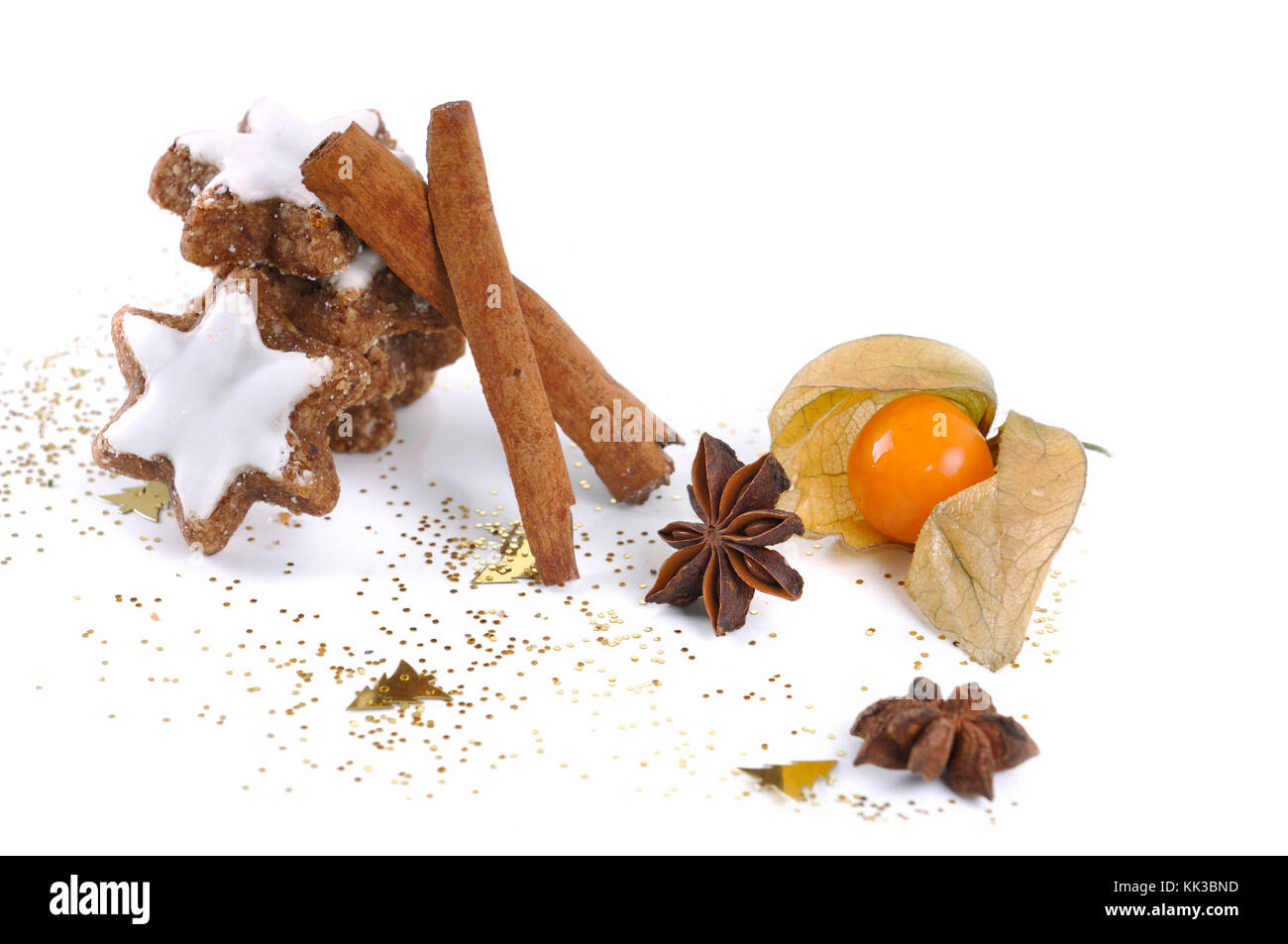 Biscuit in the cinnamon and the star anise with physalis on white background Stock Photo