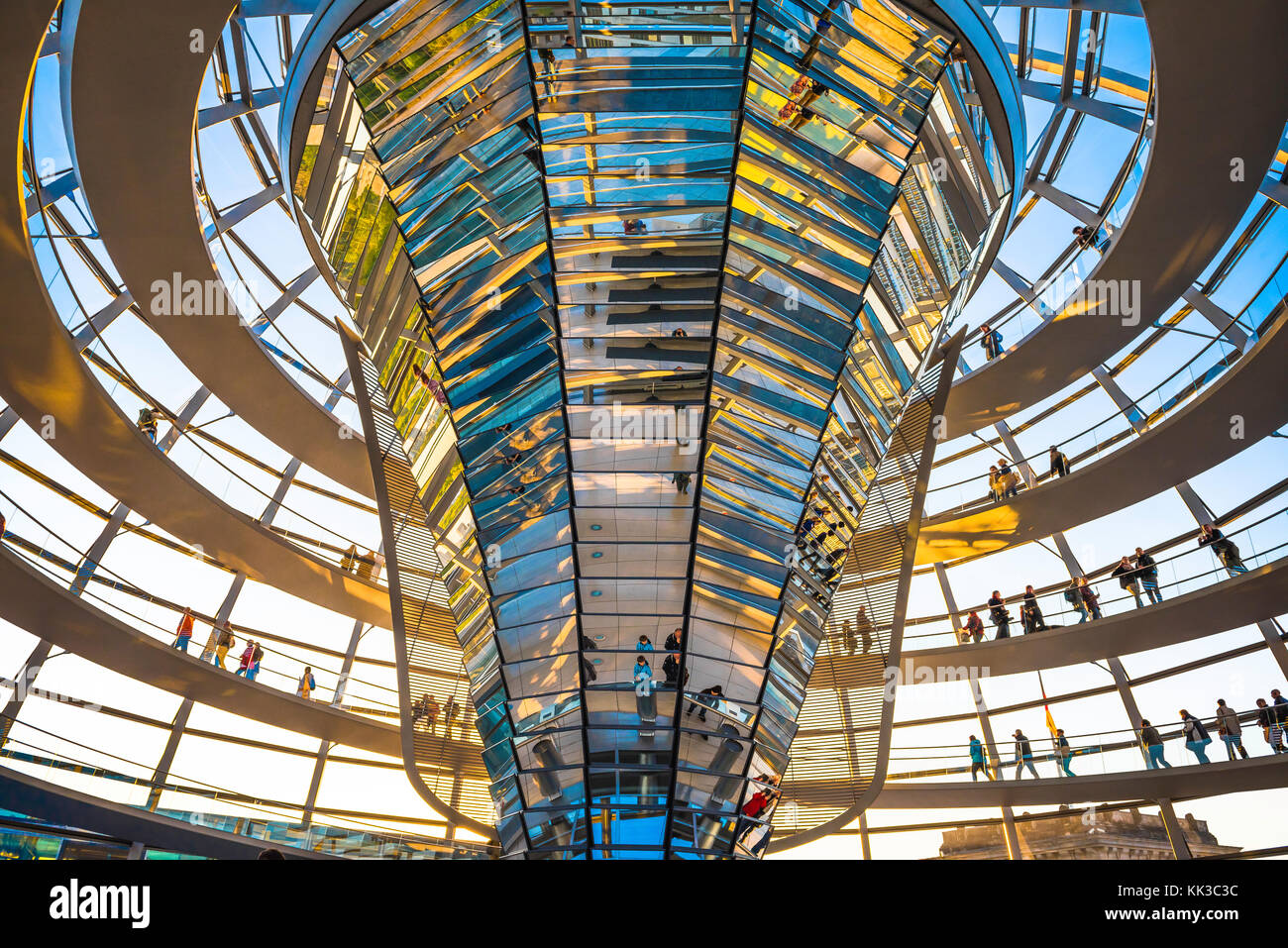 Reichstag dome Berlin, view of tourists walking on the spiral walkway inside the glass covered dome of the German parliament building, Berlin Stock Photo