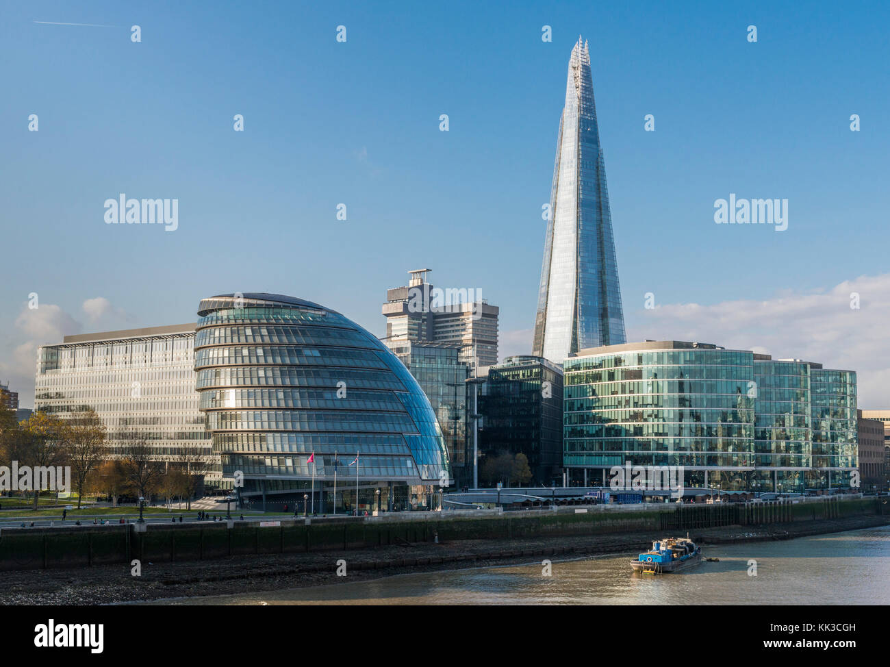 London City Hall with Shard building on River Thames - sunny Autumn day Stock Photo