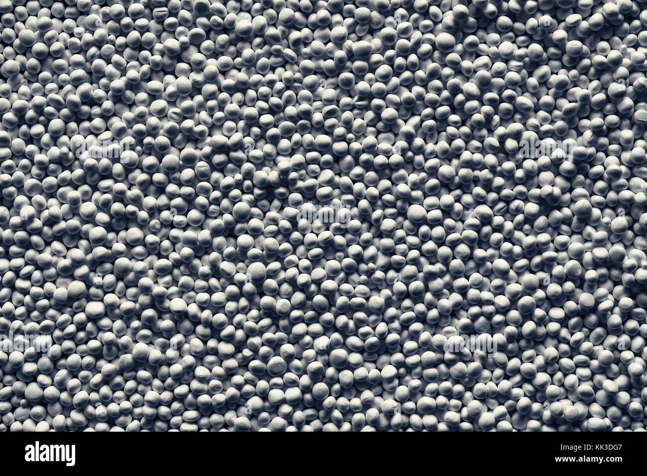 Abstract texture or background made of styrofoam balls, color toning applied. Stock Photo