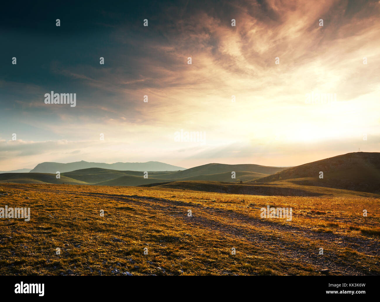 mountains at sunset Stock Photo - Alamy