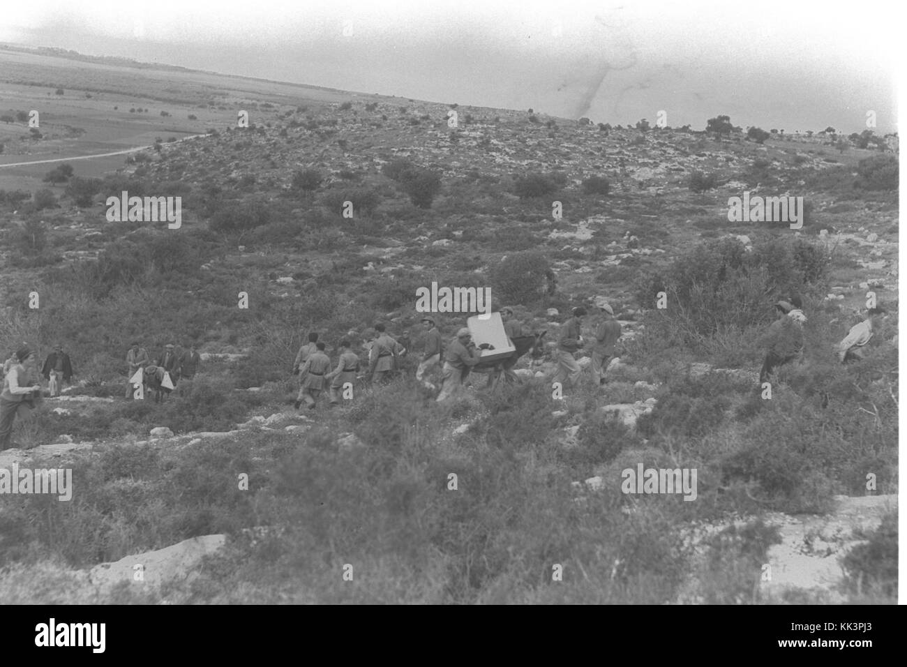 MEMBERS OF THE HAGANA AND THE JEWISH SETTLEMENT POLICE, CARRYING TOOLS