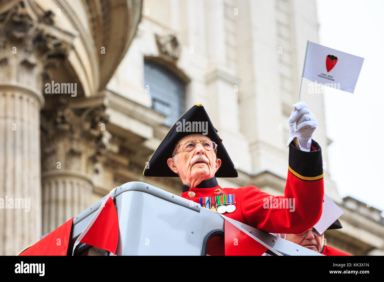 Chelsea Pensioner waving at the crowds, Lord Mayor's Show parade in the City of London, London, United Kingdom Stock Photo