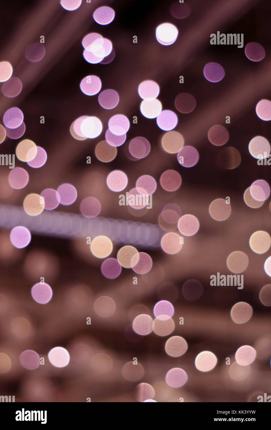 Abstract blurred and bokeh of interior decorated lighting in deep magenta color gradations, vertical photo for banner or background Stock Photo