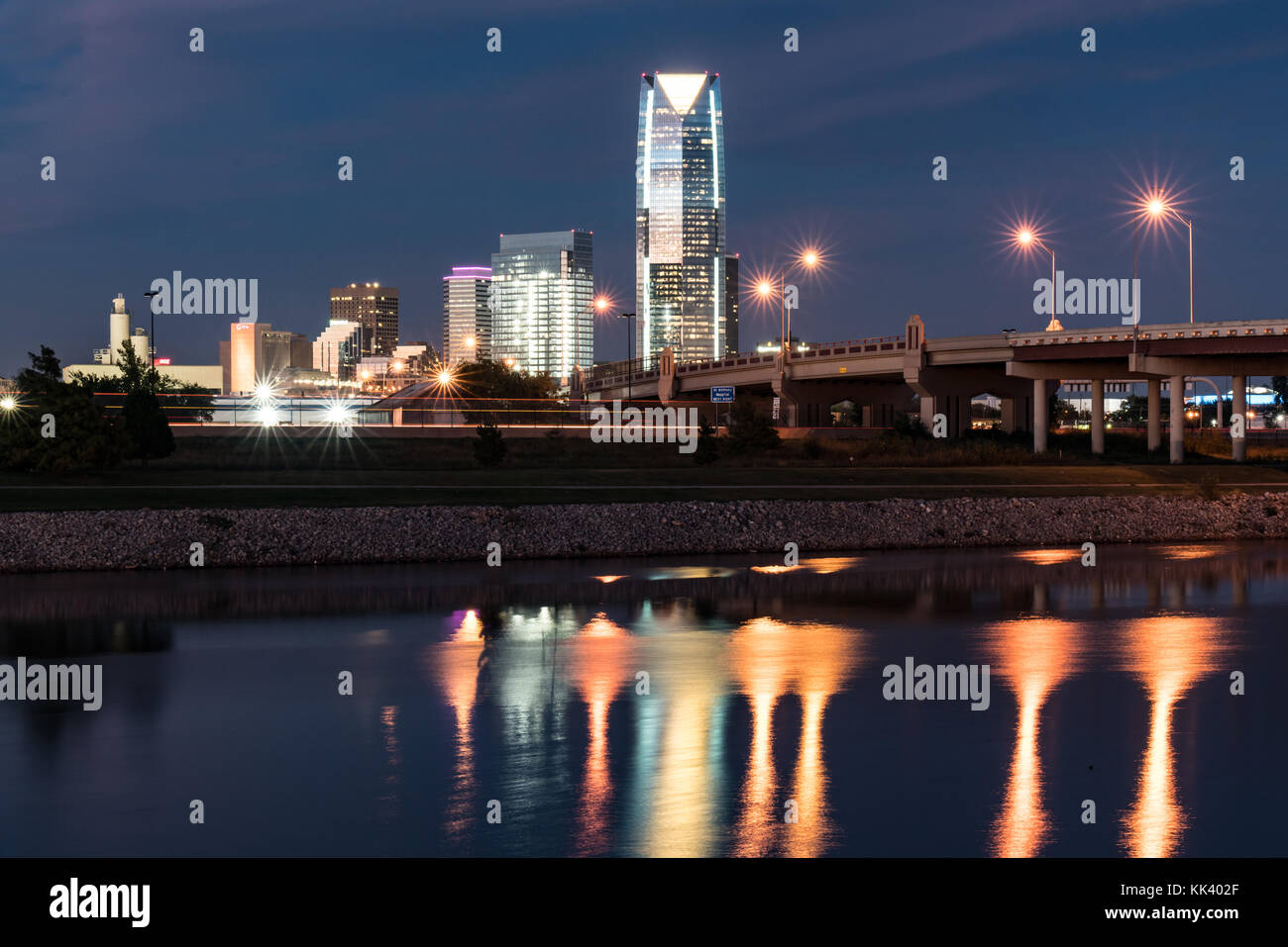 OKLAHOMA CITY, OK - OCTOBER 11, 2017: Skyline of Oklahoma City, OK at night with reflection in river Stock Photo