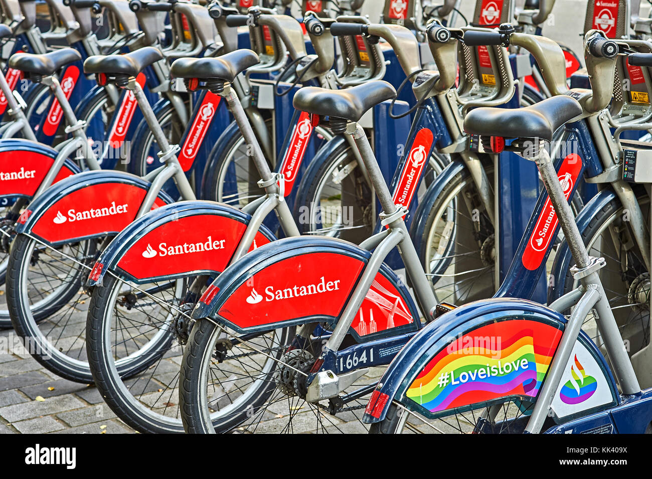 Santander bicycles for hire at a docking station in central London Stock Photo
