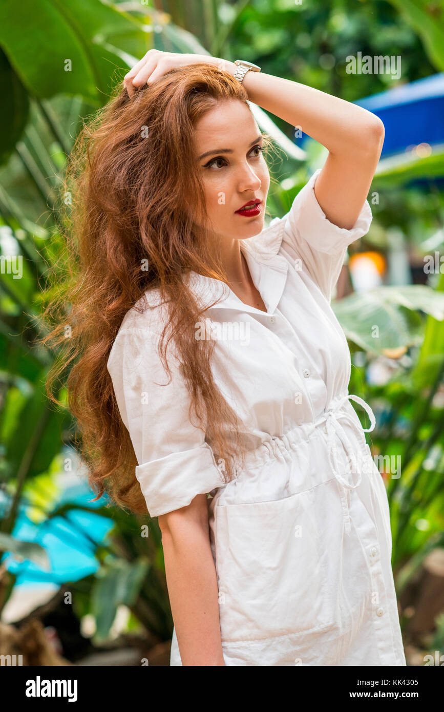 single young lady in her 20s indoor and outdoor portraits taken in