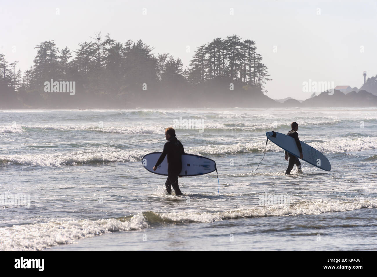 Chesterman beach near Tofino, BC, Canada (September 2017) - Two men holding surfing boards. Stock Photo