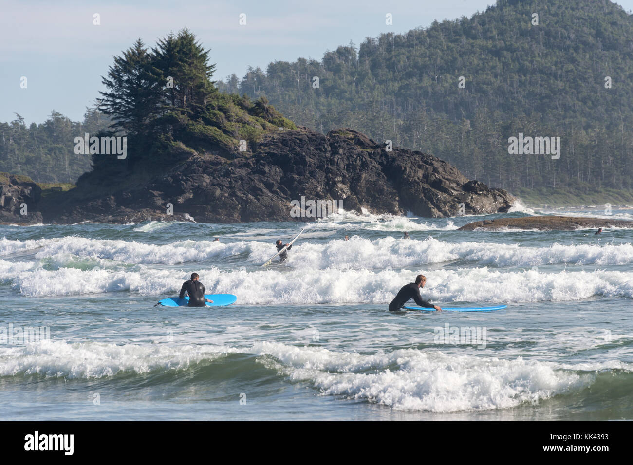 Surfers on Chesterman beach near Tofino, BC, Canada (September 2017) Stock Photo