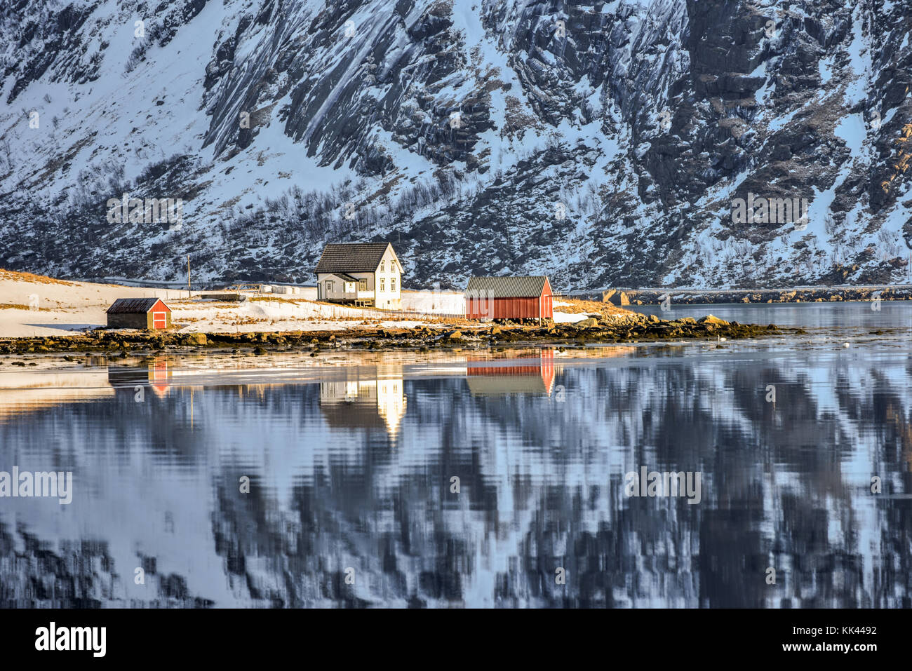 Boosen by Bo with mountains reflecting in the water. In the Lofoten ...