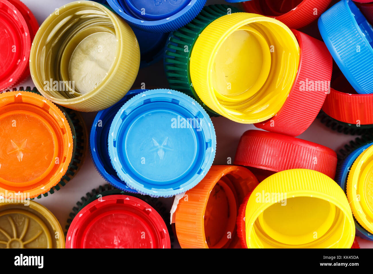 many plastic covers of different colors scattered Stock Photo Alamy