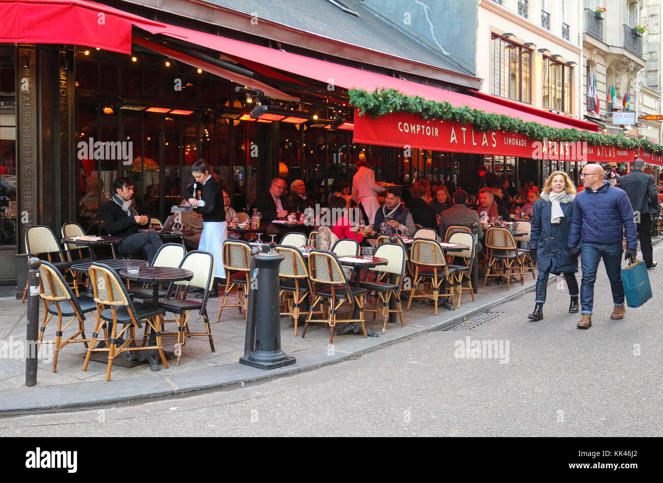 The traditional French cafe Atlas decorated for Christmas, Paris, France. Stock Photo