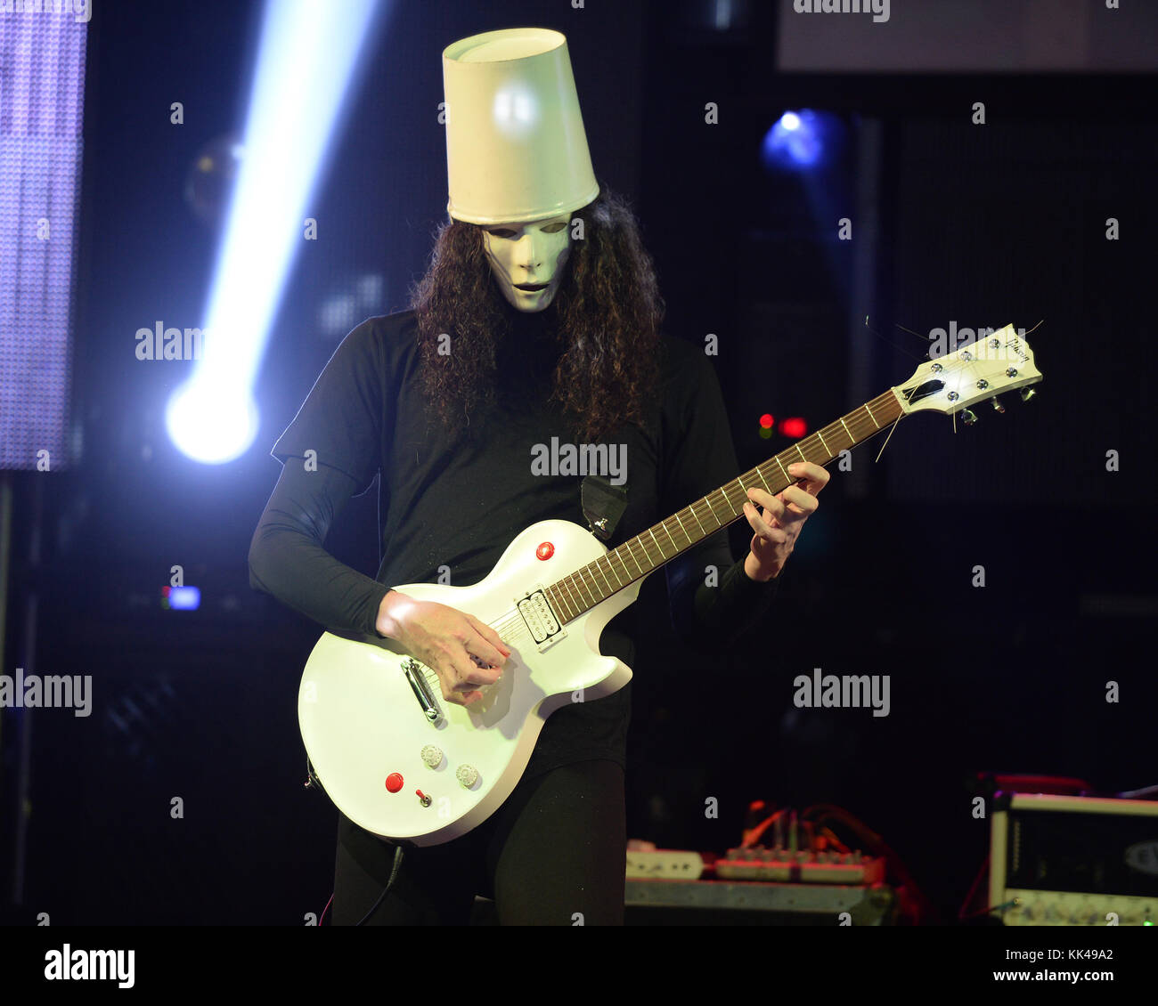 FORT LAUDERDALE, FL - FEBRUARY 28: Brian Patrick Carroll AKA Buckethead performs at The Culture Room. Brian Patrick Carroll (born May 13, 1969), known professionally as Buckethead, is an American guitarist and multi-instrumentalist who has worked within many genres of music. He has released 264 studio albums, four special releases and one EP. He has also performed on more than 50 other albums by other artists. His music spans such diverse areas as progressive metal, funk, blues, jazz, bluegrass, ambient, and avant-garde music. Buckethead is famous for wearing a KFC bucket on his head, emblazon Stock Photo