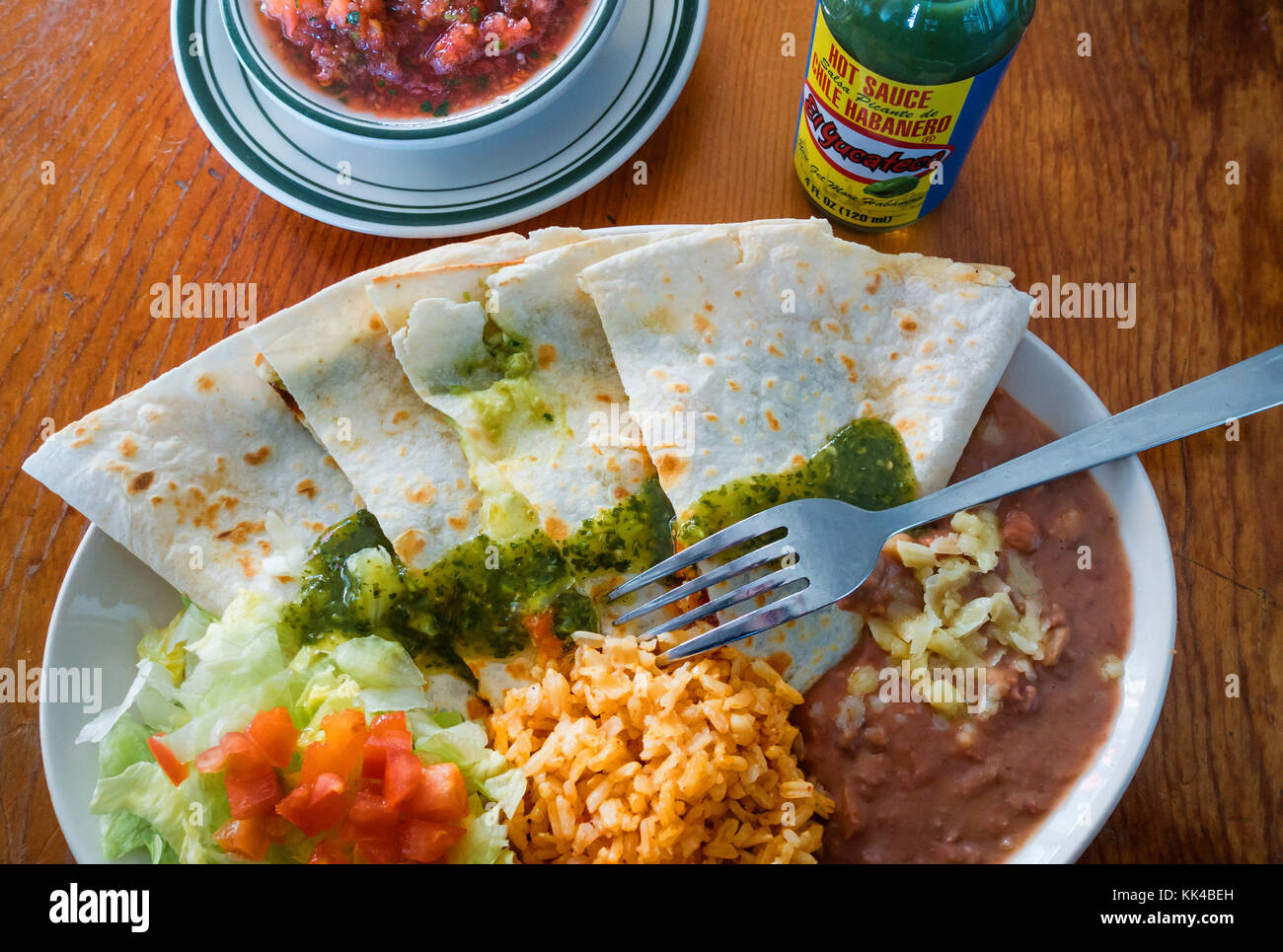 Super quesadilla with refried beans, rice, salad, hot sauce and salsa fresca at Lupe's Mexican