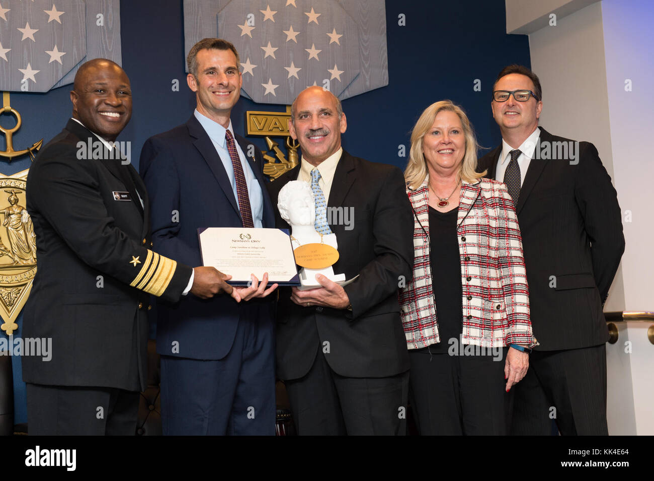 Michael Katz, Camp Sunshine Executive Director, accepts the highest honor and a $50,000 award during the 2017 NewmanÕs Own Awards at the Hall of Heroes in the Pentagon, Oct. 11, 2017. Camp Sunshine provides retreats combining respite, recreation and support for children with life-threatening illnesses and their families through the various stages of a childÕs illness. The annual competition seeks to reward ingenuity for programs that benefit service men, women, and their families. To date, the competition has recognized 174 programs with awards totally $1, 725,000. (DoD Photo by U.S. Army Sgt. Stock Photo