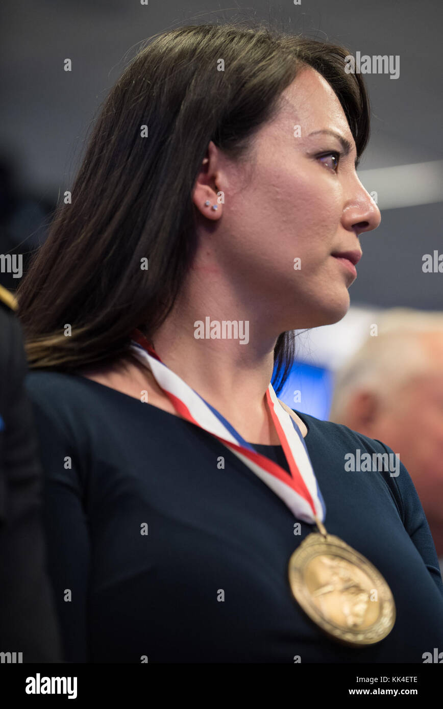Jennifer Correia, the U.S. Army Awardee, views other awardees during the 2017 Spirit of Hope Awards at the Hall of Heroes in the Pentagon, Oct. 26, 2017. The Spirit of Hope Award is awarded to men and women of the U.S. Armed Forces, entertainers, and other distinguished Americans and organizations whose patriotism and service reflect that of Mr. Bob Hope. The recipients selflessly contributed an extraordinary amount of time, talent, or resources to significantly enhance the quality of life or service members and their families serving around the world. (DoD Photo by U.S. Army Sgt. James K. McC Stock Photo
