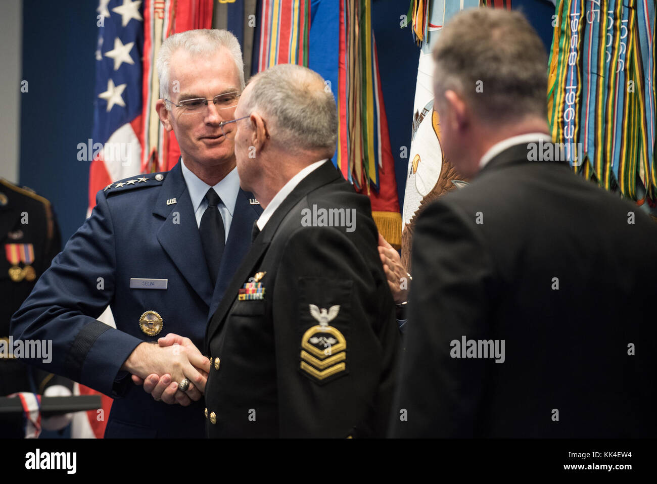 U.S. Air Force Gen. Paul J. Selva, Vice Chairman of the Joint Chiefs of Staff, greets Retired U.S. Navy Chief Petty Officer Jim Marshall, the U.S. Navy awardee, during the 2017 Spirit of Hope Awards at the Hall of Heroes in the Pentagon, Oct. 26, 2017. The Spirit of Hope Award is awarded to men and women of the U.S. Armed Forces, entertainers, and other distinguished Americans and organizations whose patriotism and service reflect that of Mr. Bob Hope. The recipients selflessly contributed an extraordinary amount of time, talent, or resources to significantly enhance the quality of life or ser Stock Photo
