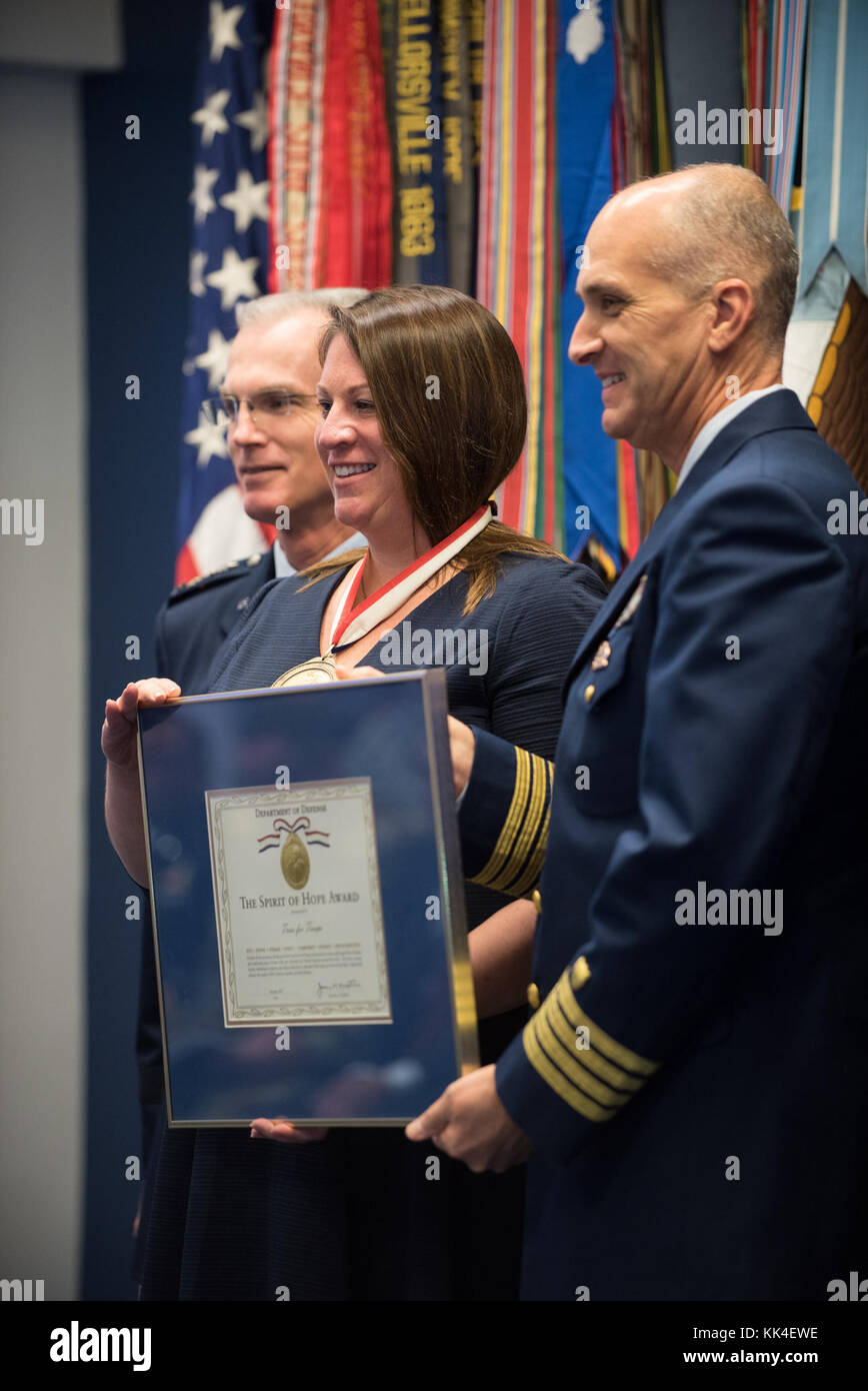 Ann O' Connor, accepting on behalf of Trees for Troops - the U.S. Coast Guard awardee, with U.S. Air Force Gen. Paul J. Selva, Vice Chairman of the Joint Chiefs of Staff, and others during the 2017 Spirit of Hope Awards at the Hall of Heroes in the Pentagon, Oct. 26, 2017. The Spirit of Hope Award is awarded to men and women of the U.S. Armed Forces, entertainers, and other distinguished Americans and organizations whose patriotism and service reflect that of Mr. Bob Hope. The recipients selflessly contributed an extraordinary amount of time, talent, or resources to significantly enhance the q Stock Photo