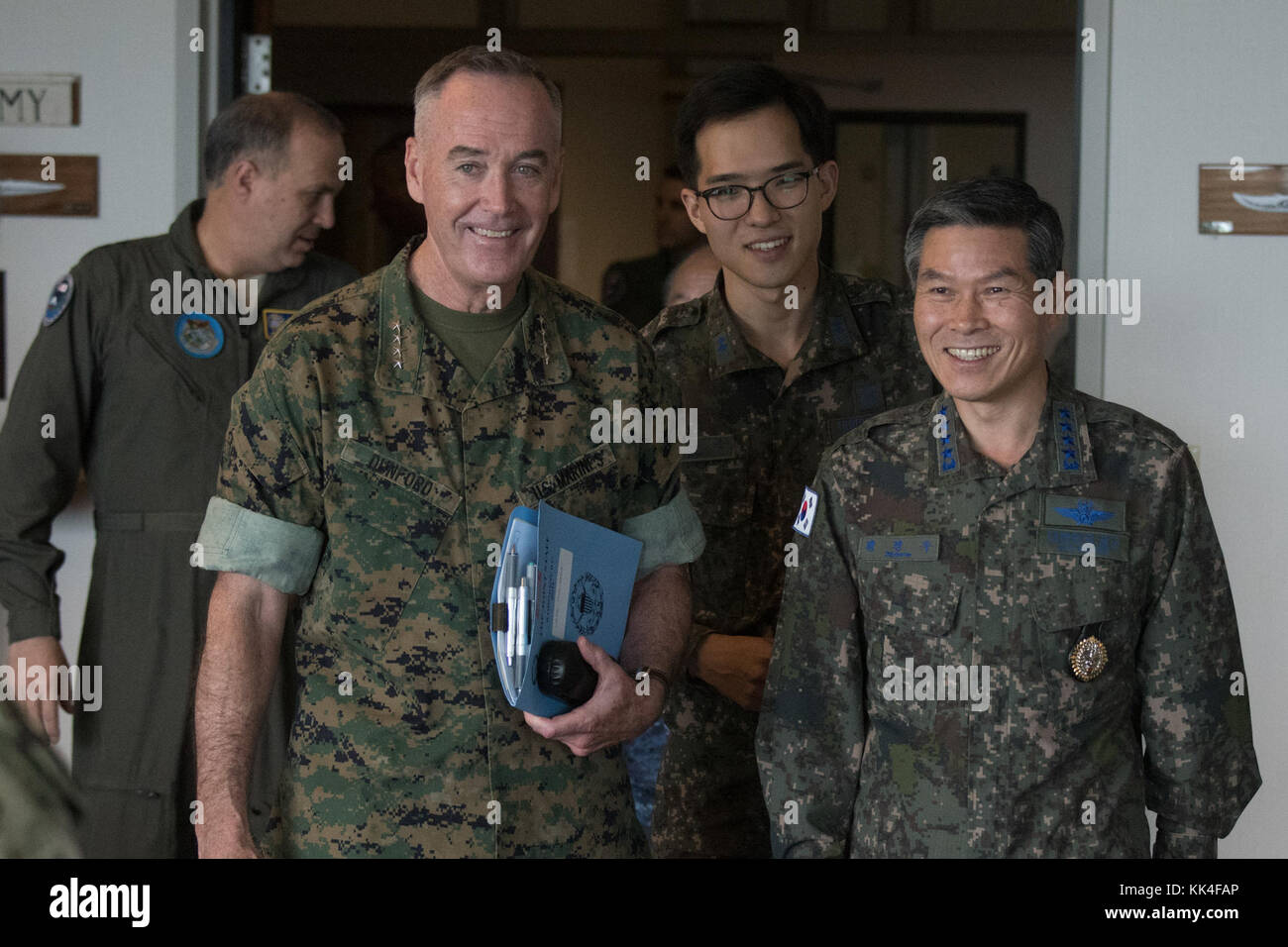 Marine Corps Gen. Joseph F. Dunford Jr., Chairman of the Joint Chiefs of Staff, Japan Self-Defense Force Chief of Staff, Adm. Katsutoshi Kawano, Republic of Korea Chairman of the Joint Chiefs of Staff, Gen. Jeong Kyeong-doo, and Commander, U.S. Pacific Command (USPACOM), Adm. Harry Harris gather for trilateral meeting at USPACOM headquarters. The session was the fifth between the senior most U.S., ROK and Japanese military officers since July, 2014. The leaders discussed multilateral and bilateral initiatives designed to improve interoperability and readiness as well as North Korea’s recent lo Stock Photo