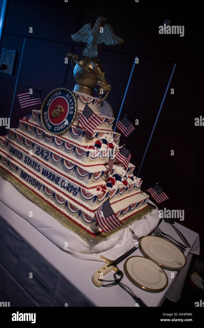 Marines view the 242nd Marine Corps Birthday cake before the Semper Fidelis Society Boston U.S. Marine Corps Birthday Luncheon at the Boston Convention & Exhibition Center, Massachusetts, Nov. 13, 2017. (DoD Photo by U.S. Army Sgt. James K. McCann) Stock Photo