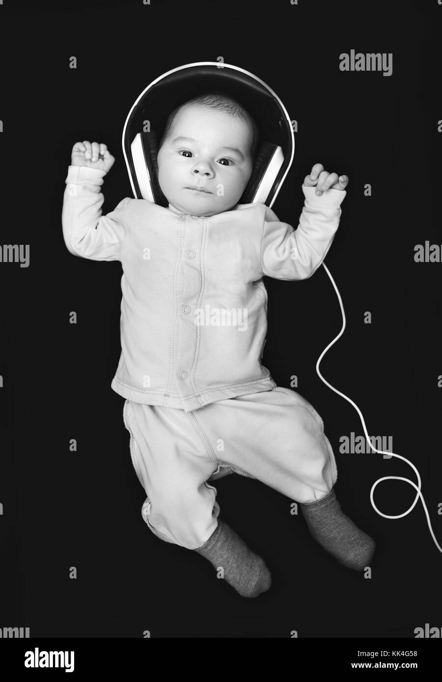 newborn with headphones Stock Photo