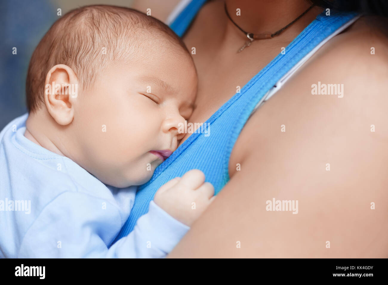 mother holding newborn baby Stock Photo