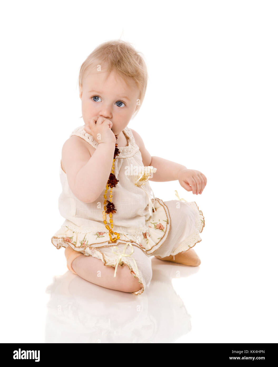 Six month Baby playing with toys isolated on white Stock Photo - Alamy