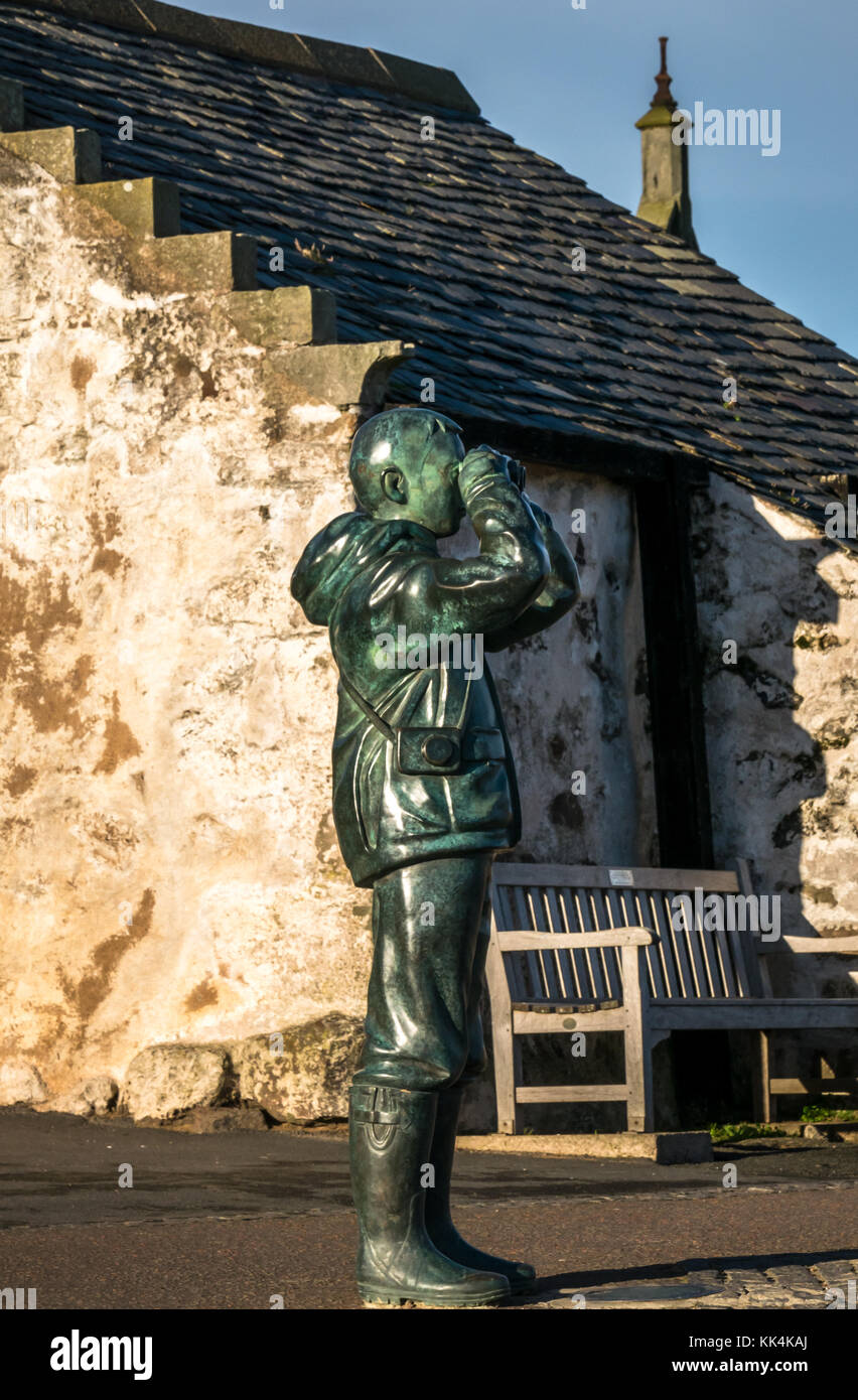 Birdwatcher bronze life size statue, The Watcher by sculptor Kenny Hunter outside Scottish Seabird Centre, North Berwick, East Lothian, Scotland, UK Stock Photo
