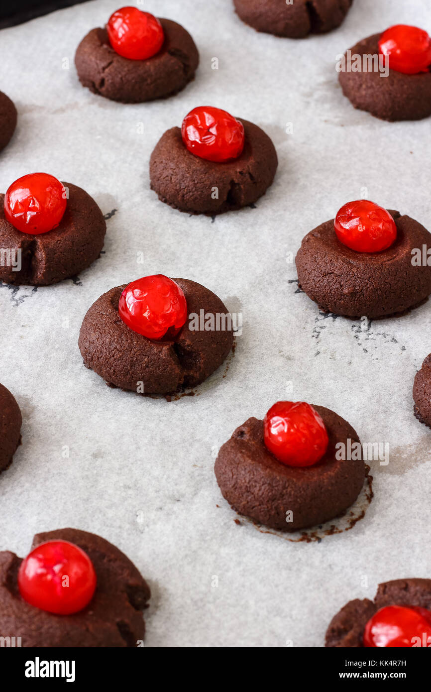 Chocolate Thumbprint Cookies with Maraschino Cherries Stock Photo Alamy