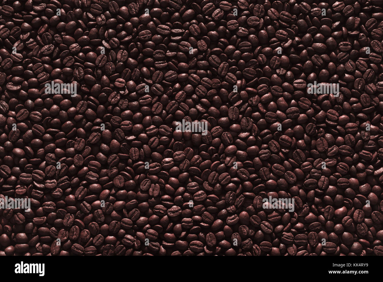 Roasted coffee beans on a flat background Stock Photo - Alamy