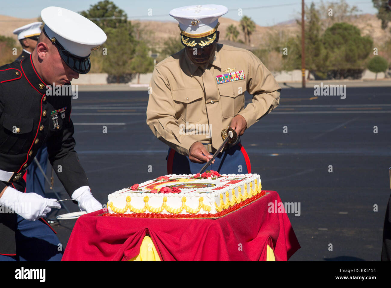 Colonel Sekou Karega, commander, Marine Corps Logistics Base Barstow, Calif., cuts the traditional birthday cake during a ceremony on the Parade Deck Nov. 8 commemorating the 242nd anniversary of the founding of the Marine Corps. The Marines were formed as an American fighting force Nov. 10, 1775 during a meeting at Tun Tavern in Philadelphia. Stock Photo