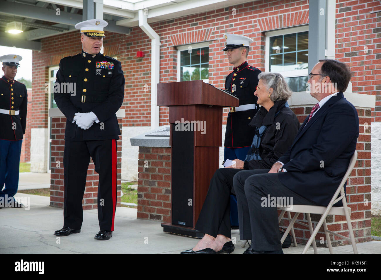 Brig. Gen. Julian Alford speaks to the family of Gen. Louis H. Wilson
