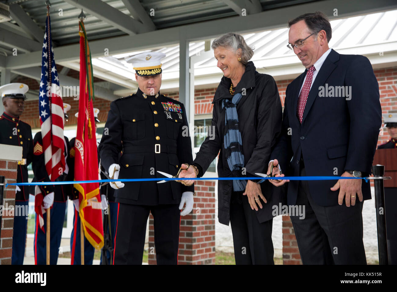 Brig. Gen. Julian Alford, left, Taylor, center, and her husband