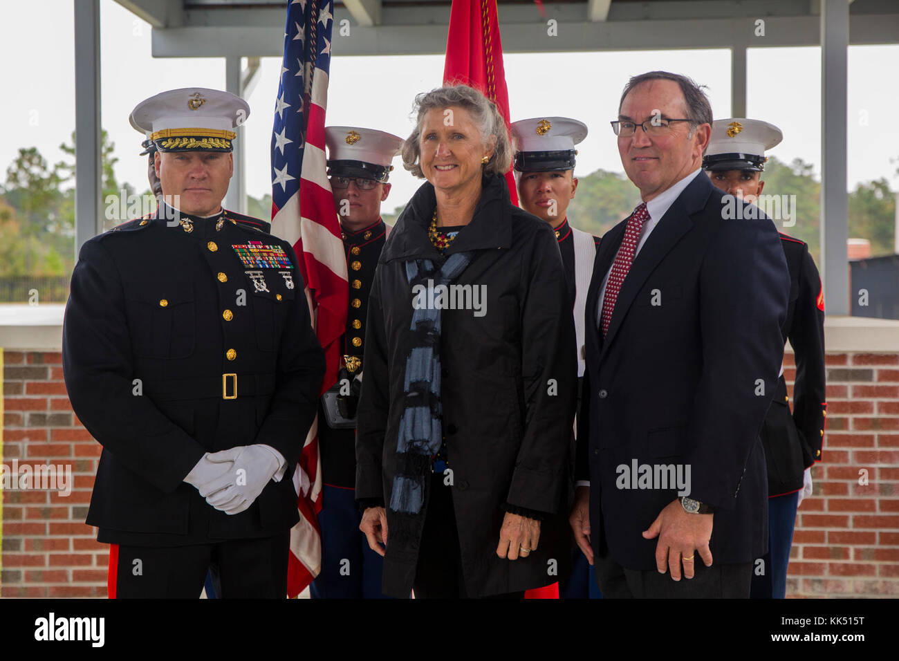 Brig. Gen. Julian Alford, left, Taylor, center, and her husband
