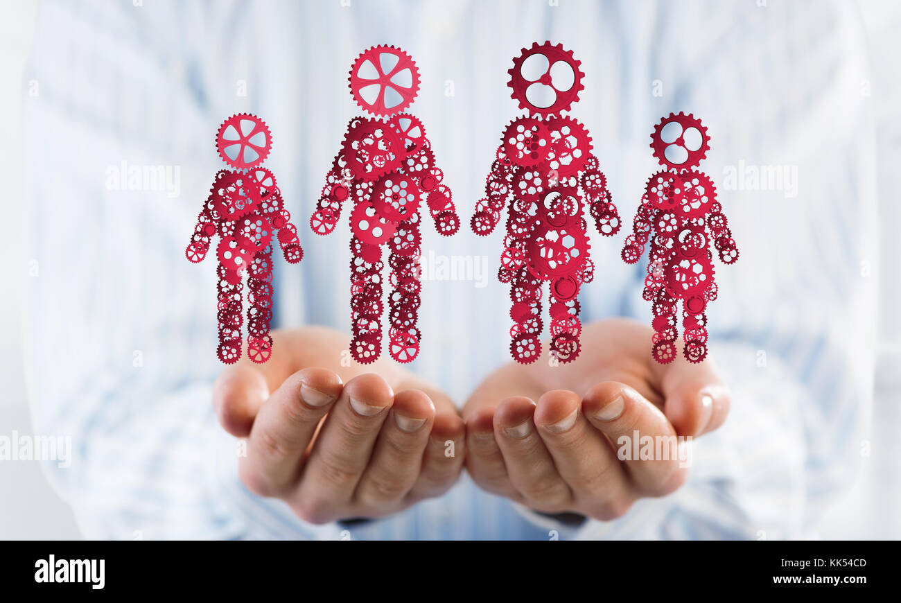 Green symbols of family members as one mechanism presented in man palms Stock Photo