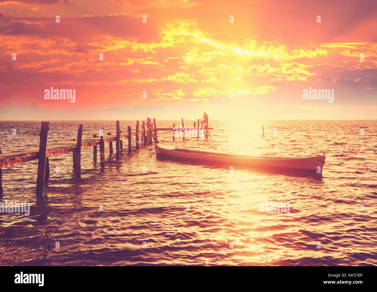 Scenic sunset at the sea coast Stock Photo - Alamy