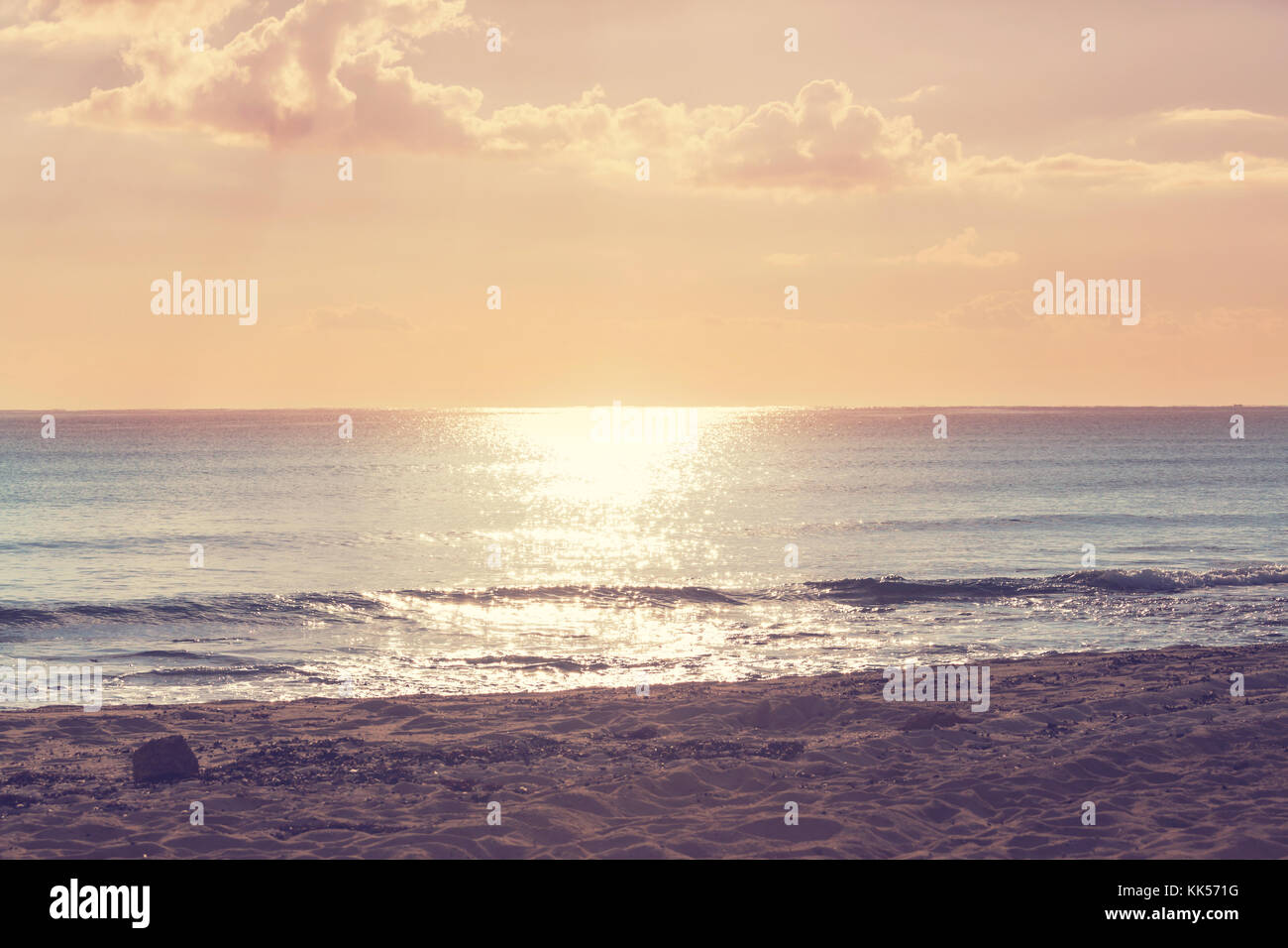 Scenic sunset at the sea coast Stock Photo - Alamy