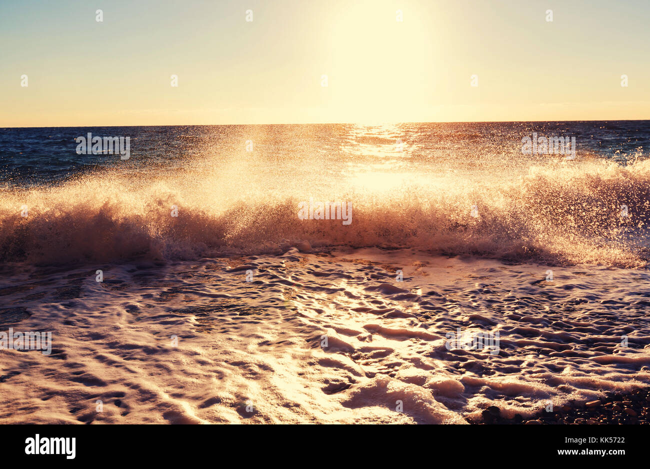 Scenic sunset at the sea coast Stock Photo - Alamy