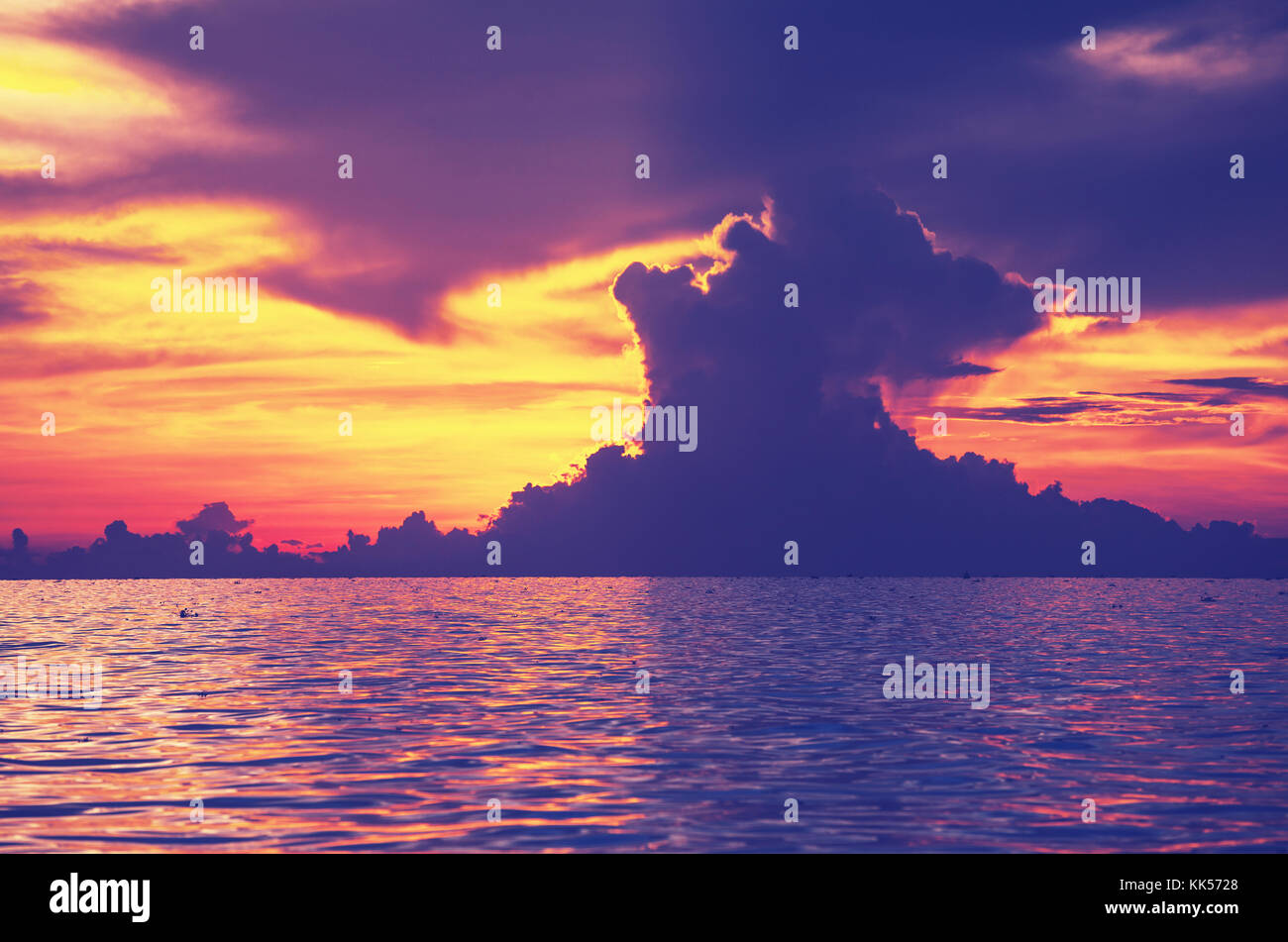 Scenic sunset at the sea coast Stock Photo - Alamy