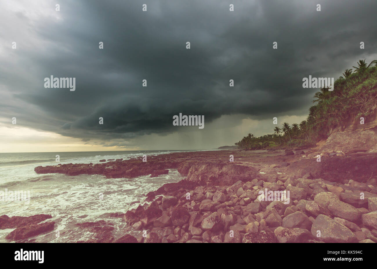 Rain over the stormy ocean Stock Photo - Alamy