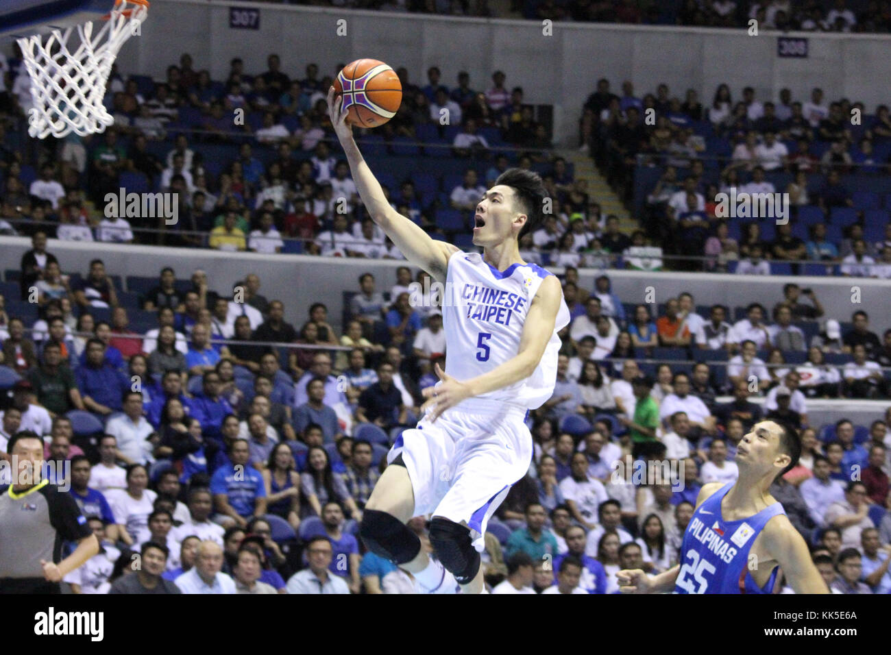 Quezon City, Philippines. 27th Nov, 2017. Chen Liu (5) of Chinese Taipei soars for an open lay-up during thier FIBA World Cup Qualifiers against the Philippines. Gilas Pilipinas defeated the visiting Chinese Taipei team 90-83 to complete a sweep of their first two assignments in the FIBA 2019 World Cup qualifiers. Credit: Dennis Jerome Acosta/ Pacific Press/Alamy Live News Stock Photo
